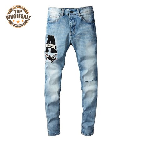 Amiri Logo Patch Rip Jeans Blue